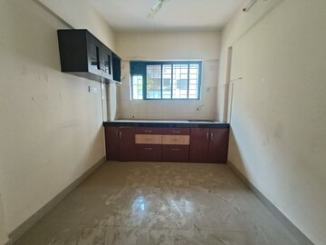 Kitchen in 1 BHK Apartment at Dharmavat Sunder Samruddhi, Dhayari – for Sale