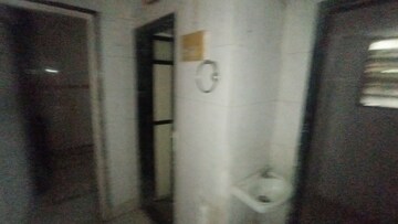 Bathroom in 1 BHK Apartment at Jai Pragati CHS, Dombivli West – for Rent