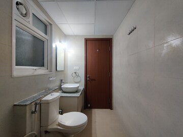 Bathroom in 2 BHK Apartment at Bhartiya Nikoo Homes Phase 2, Thanisandra Main Road – for Sale