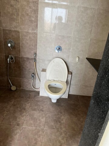 Bathroom in 3 BHK Apartment at Kolte Patil Margosa Heights, Mohammadwadi – for Rent