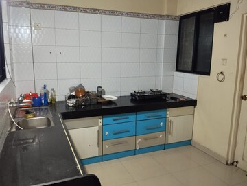 Kitchen in 2 BHK Apartment at Suvan Shades, Mundhwa – for Rent