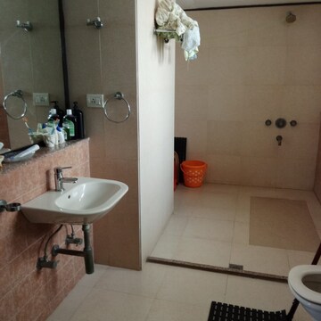 Bathroom in 4 BHK Apartment at Ambuja Neotia Upohar Luxury Gold, Garia – for Sale