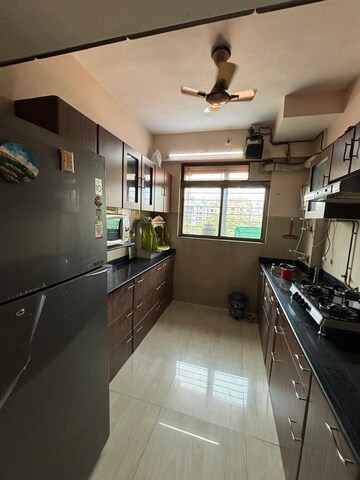 Kitchen in 3 BHK Apartment at Swastik Regalia, Waghbil – for Rent
