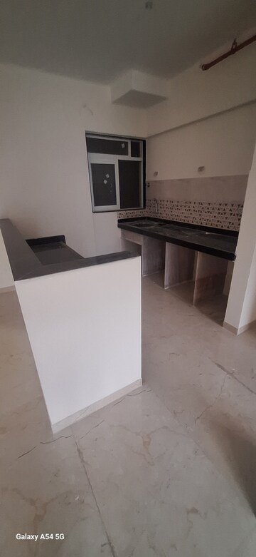Kitchen in 2 BHK Apartment at Mahavir Square, Manpada – for Sale