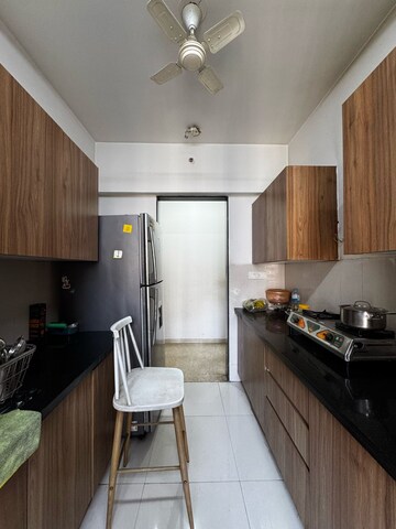 Kitchen in 2.5 BHK Apartment at Platinum CHS, Waghbil – for Rent