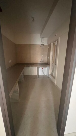 Kitchen in 2 BHK Apartment at Dosti West County, Balkum Pada – for Sale