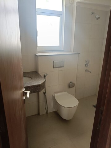 Bathroom in 3.5 BHK Apartment at Elite Golf Green, Sector 79 – for Rent