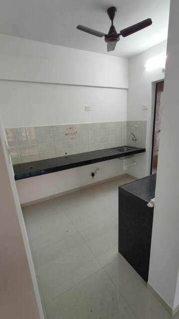 Kitchen in 2 BHK Apartment at Shapoorji Pallonji Joyville Celestia, Hadapsar – for Rent
