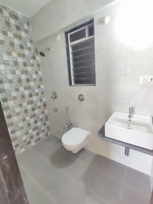 Attached Bathroom in 1 BHK Apartment at Vijay Galaxy, Waghbil – for Sale