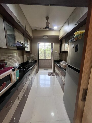 Kitchen in 3 BHK Apartment at Gundecha Orchid Tower, Kandivali East – for Rent