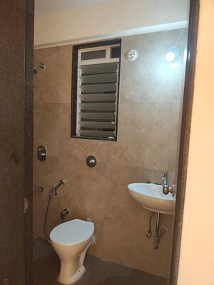 Bathroom in 1 BHK Apartment at Mahavir Kalpavruksha, Ghodbunder Road – for Sale