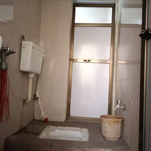Bathroom in 2 BHK Apartment at Titanium Tower, Haware City – for Sale