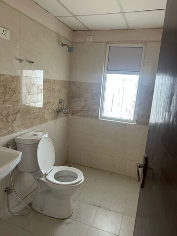 Bathroom in 3 BHK Apartment at Prateek Grand City, Siddharth Vihar – for Rent