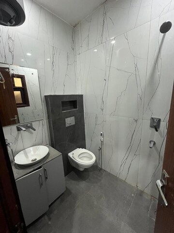 Bathroom in 4 BHK Apartment at Paradigm Business Hermitage Park, Dhakoli – for Rent