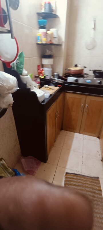 Master Bedroom in 1 BHK Apartment at Tata Mills CHS, Parel – for Rent