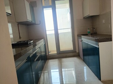 Kitchen in 2 BHK Apartment at Piramal Vaikunth, Balkum Pada – for Rent