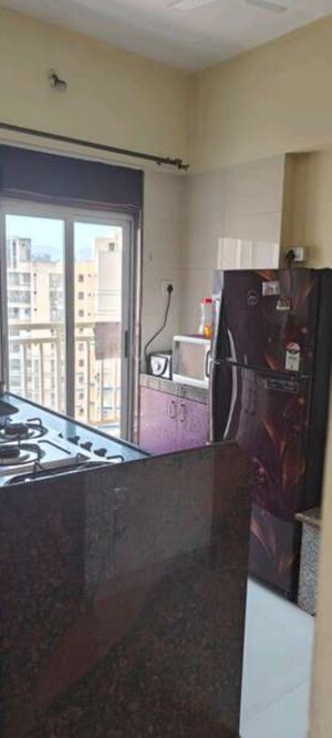 Kitchen in 1 BHK Apartment at Laabh Pehla Ghar Shubh Sanket Complex, Ghodbunder Road – for Sale