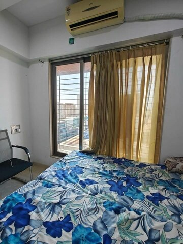 Bedroom in 2 BHK Apartment at DLH Orchid, Andheri West – for Rent