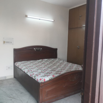 Bedroom in 2 BHK Builder Floor at Kalkaji – for Rent