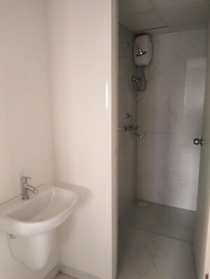 Bathroom in 1 BHK Apartment at Runwal Gardens, Dombivli East – for Sale