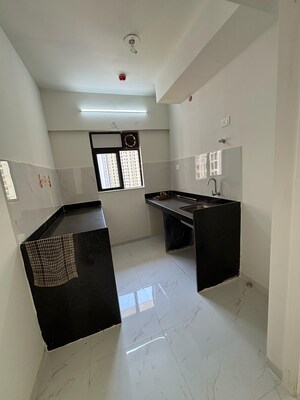 Master Bedroom in 1 BHK Apartment at Runwal Gardens, Dombivli East – for Sale