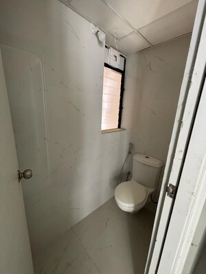 Bathroom in 1 BHK Apartment at Runwal Gardens, Dombivli East – for Sale