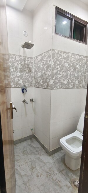 Bathroom in 2 BHK Builder Floor at Dwarka Mor – for Rent