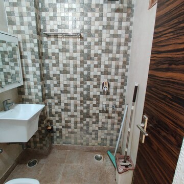 Bathroom in 2 BHK Builder Floor at Dwarka Mor – for Rent