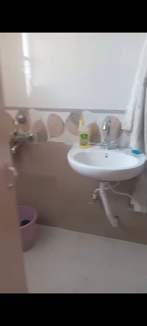 Bathroom in 2 BHK Apartment at Nitishree Aura Chimera, Raj Nagar Extension – for Sale