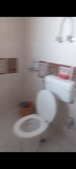 Bathroom in 2 BHK Apartment at Nitishree Aura Chimera, Raj Nagar Extension – for Sale