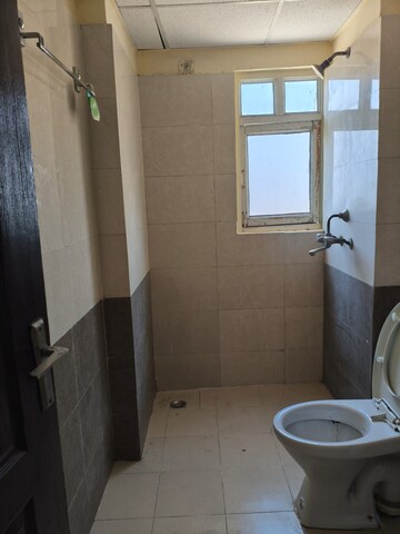 Bathroom in 2 BHK Apartment at Amrapali Silicon City, Sector 76 – for Rent