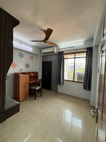 Living Room in 2 BHK Apartment at Lalani Residency, Kavesar – for Rent