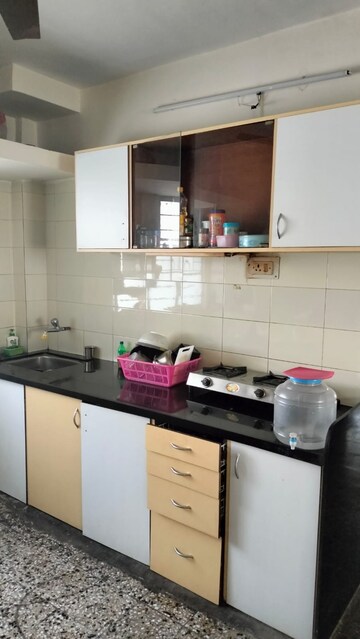 Kitchen in 2 BHK Apartment at Meera Nagar Garden CHS, Koregaon Park – for Rent