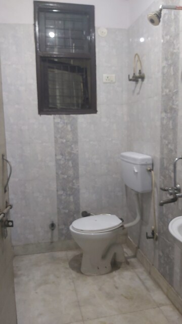 Bathroom in 2.5 BHK Builder Floor at Pandav Nagar – for Sale