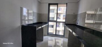 Kitchen in 2 BHK Apartment at Ani Anu Sri Balaji Enclave, Malad West – for Sale