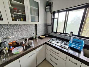 Kitchen in 2 BHK Apartment at Ani Anu Sri Balaji Enclave, Malad West – for Sale