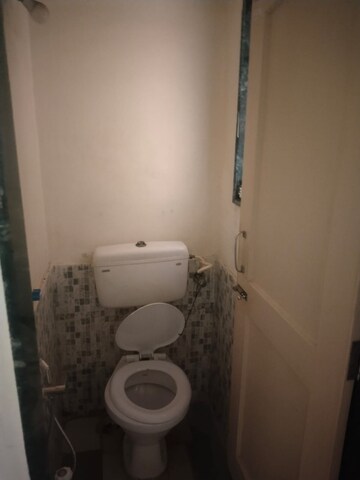 Bathroom in 1 BHK Apartment at Megh Malhar Co-op Housing Society, Ghansoli – for Rent
