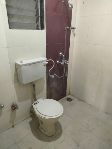 Bathroom in 2 BHK Apartment at Rutu Enclave, Kasarvadavali – for Rent