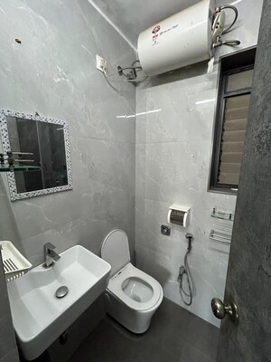Bathroom in 2 BHK Apartment at Ani Anu Sri Balaji Enclave, Malad West – for Sale