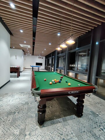 Kitchen in 4 BHK Apartment at Bhartiya Nikoo Homes Phase 2, Thanisandra Main Road – for Sale