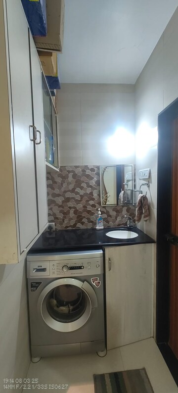 Kitchen in 3 BHK Apartment at Panchkamal CHS, Sector 29 – for Sale