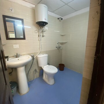 Bathroom in 3 BHK Apartment at Gardenia Golf City, Noida Central – for Rent