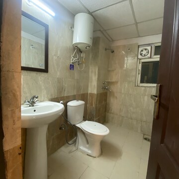 Bathroom in 3 BHK Apartment at Gardenia Golf City, Noida Central – for Rent