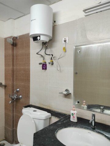 Bathroom in 3 BHK Apartment at AWHO Shanti Vihar, Sector 95 – for Rent