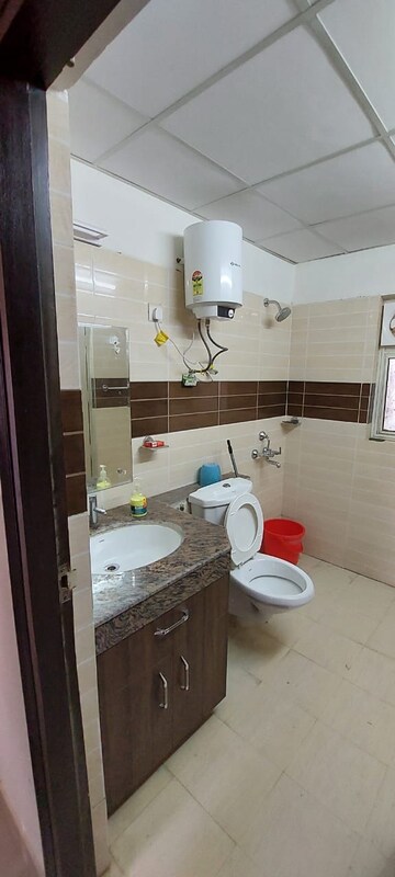 Bathroom in 3 BHK Apartment at AWHO Shanti Vihar, Sector 95 – for Rent