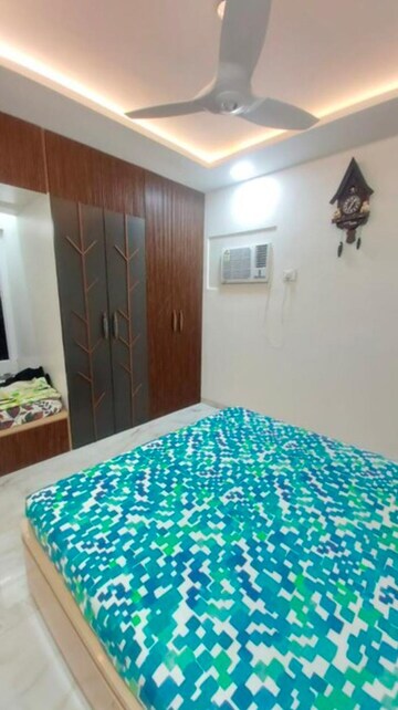 Bedroom in 2 BHK Apartment at Evershine Greens, Andheri West – for Rent