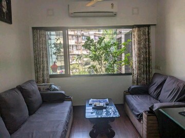 Living Room in 2 BHK Apartment at Lokhandwala Breeze Apartments, Andheri West – for Rent