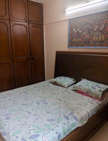 Bedroom in 2 BHK Apartment at Lokhandwala Breeze Apartments, Andheri West – for Rent