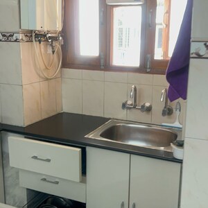 Kitchen in 3 BHK Apartment at Bhagya Laxmi Apartment, Rohini Sector 7 – for Sale