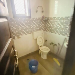 Bathroom in 3 BHK Apartment at Bhagya Laxmi Apartment, Rohini Sector 7 – for Sale